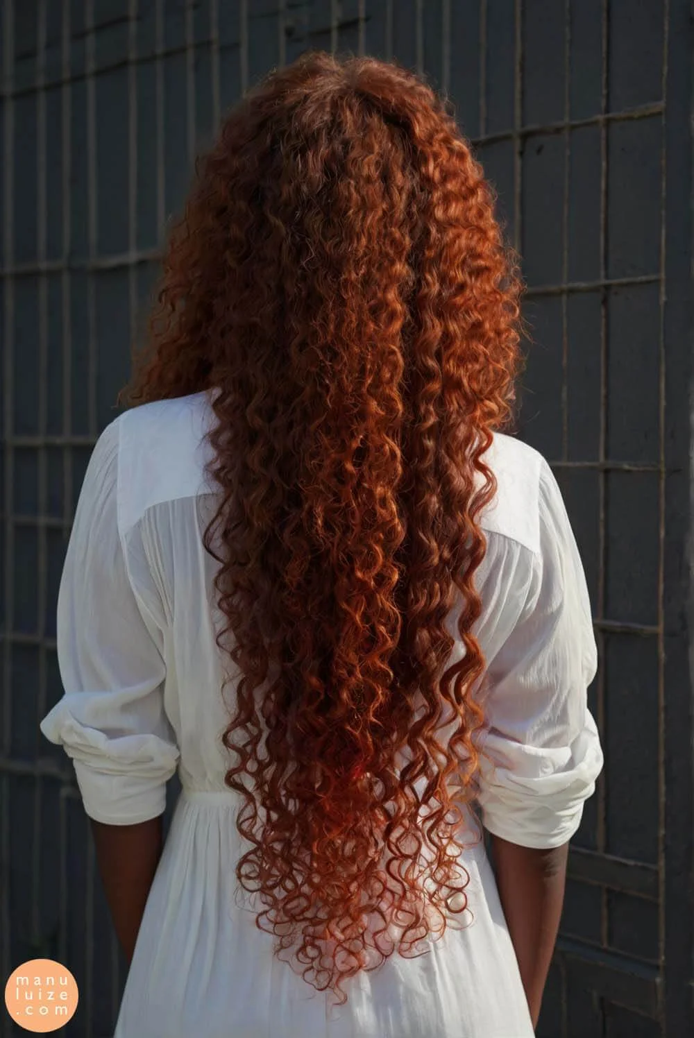 Long curly copper red hair