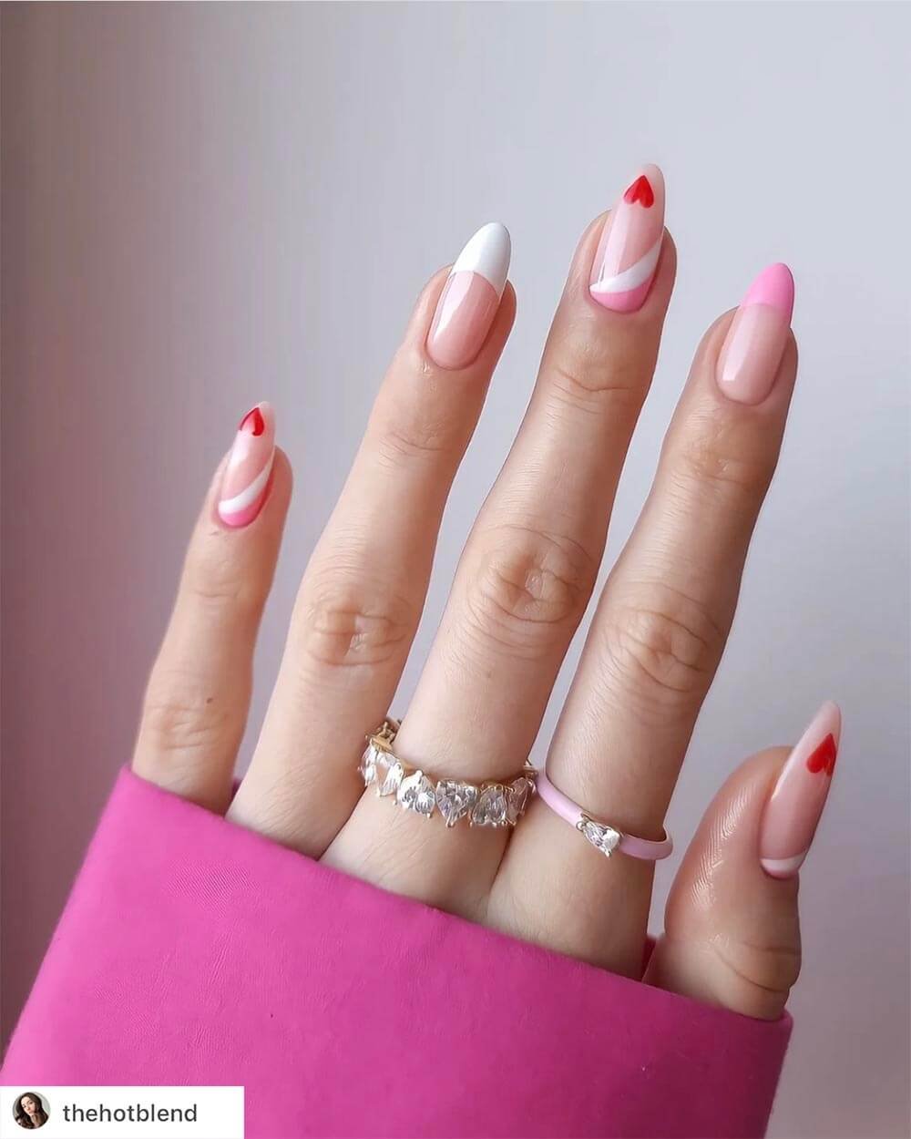 Pink heart nail art as Valentine nails