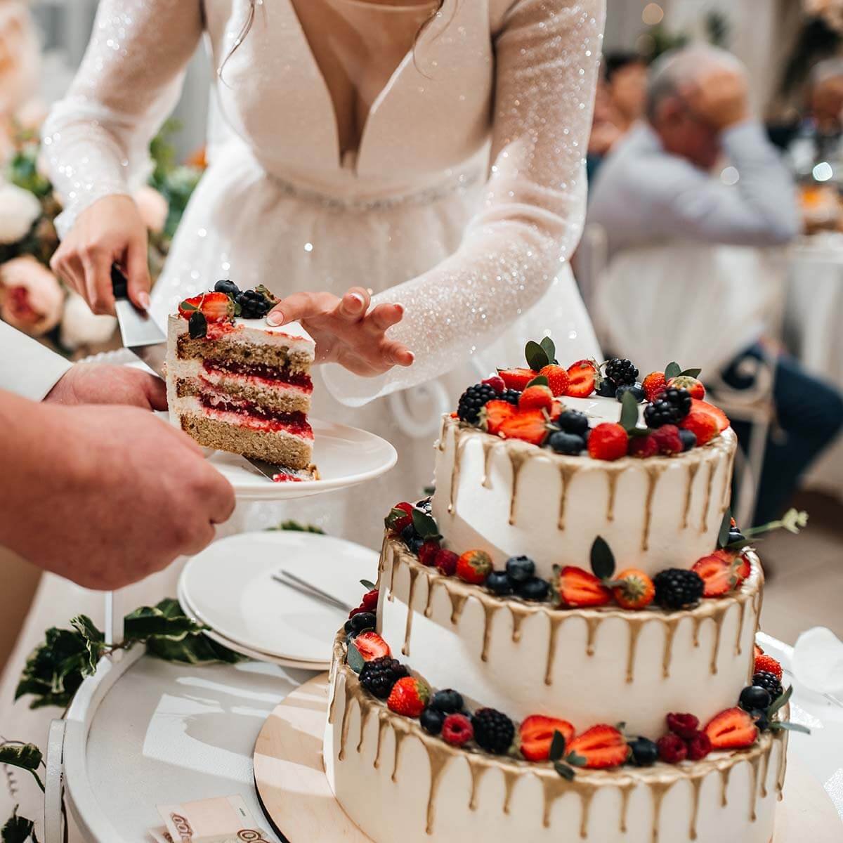 chic white cake with red fruits