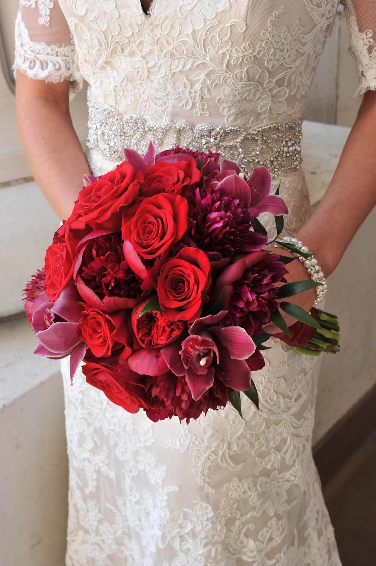 round red bride bouquet with roses