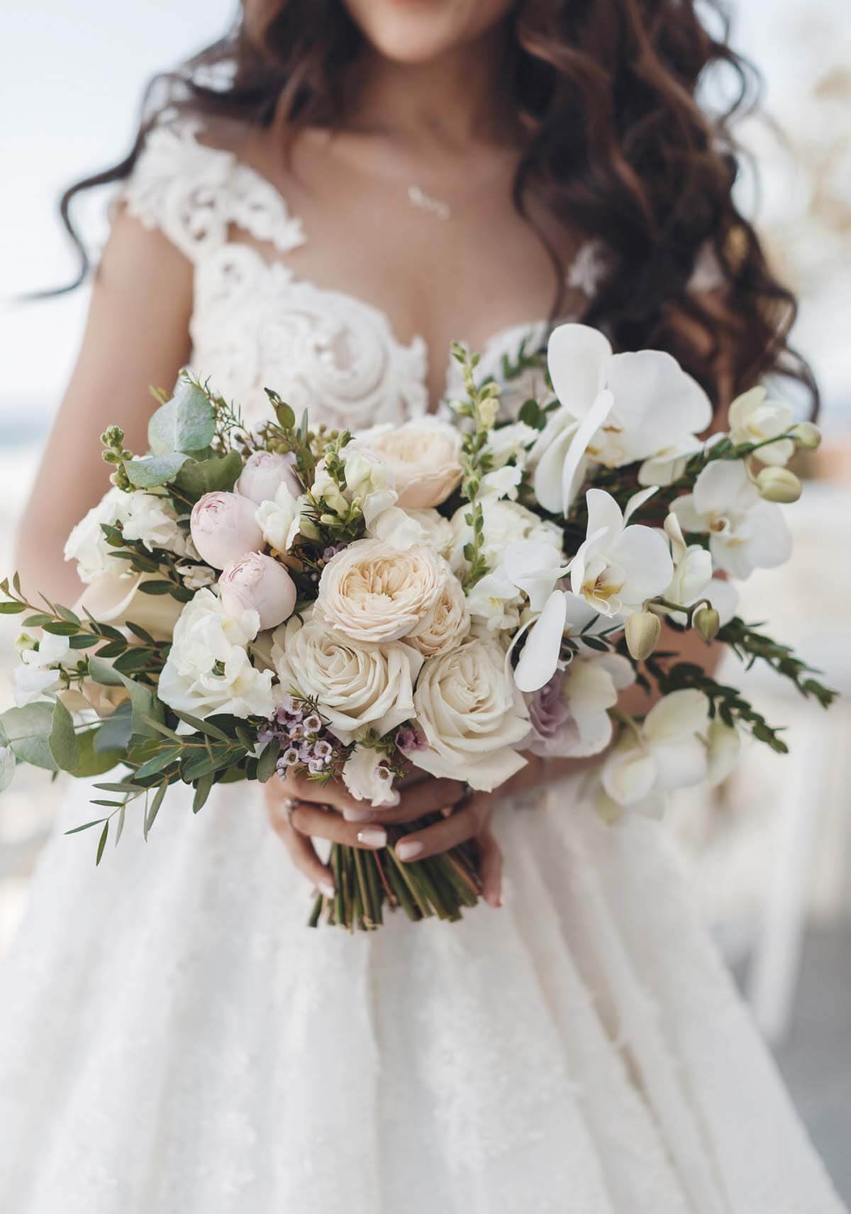 white and pastel flowers bridal bouquet