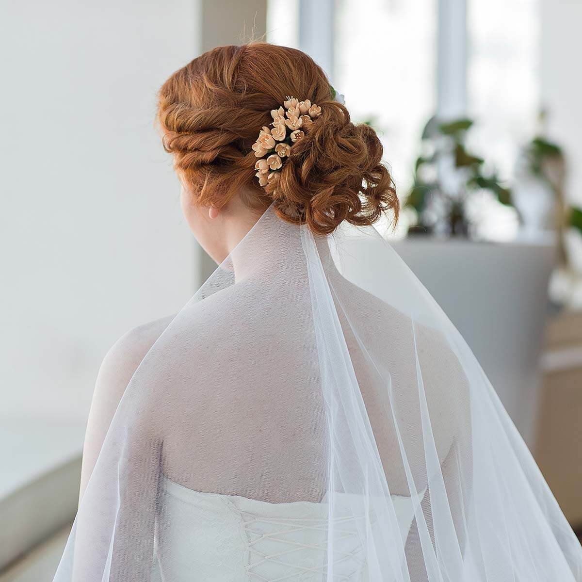Red hair bride with chic updo