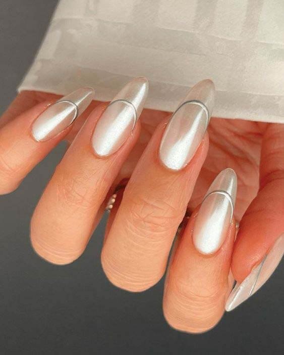 White chrome nails with silver French tips