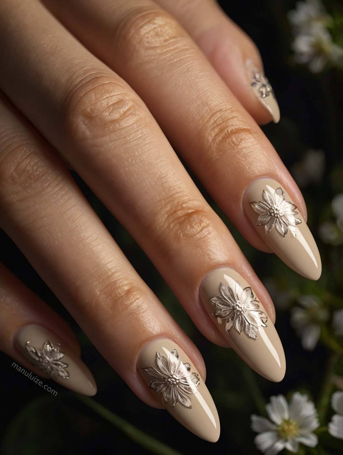 Nude nails with silver flowers
