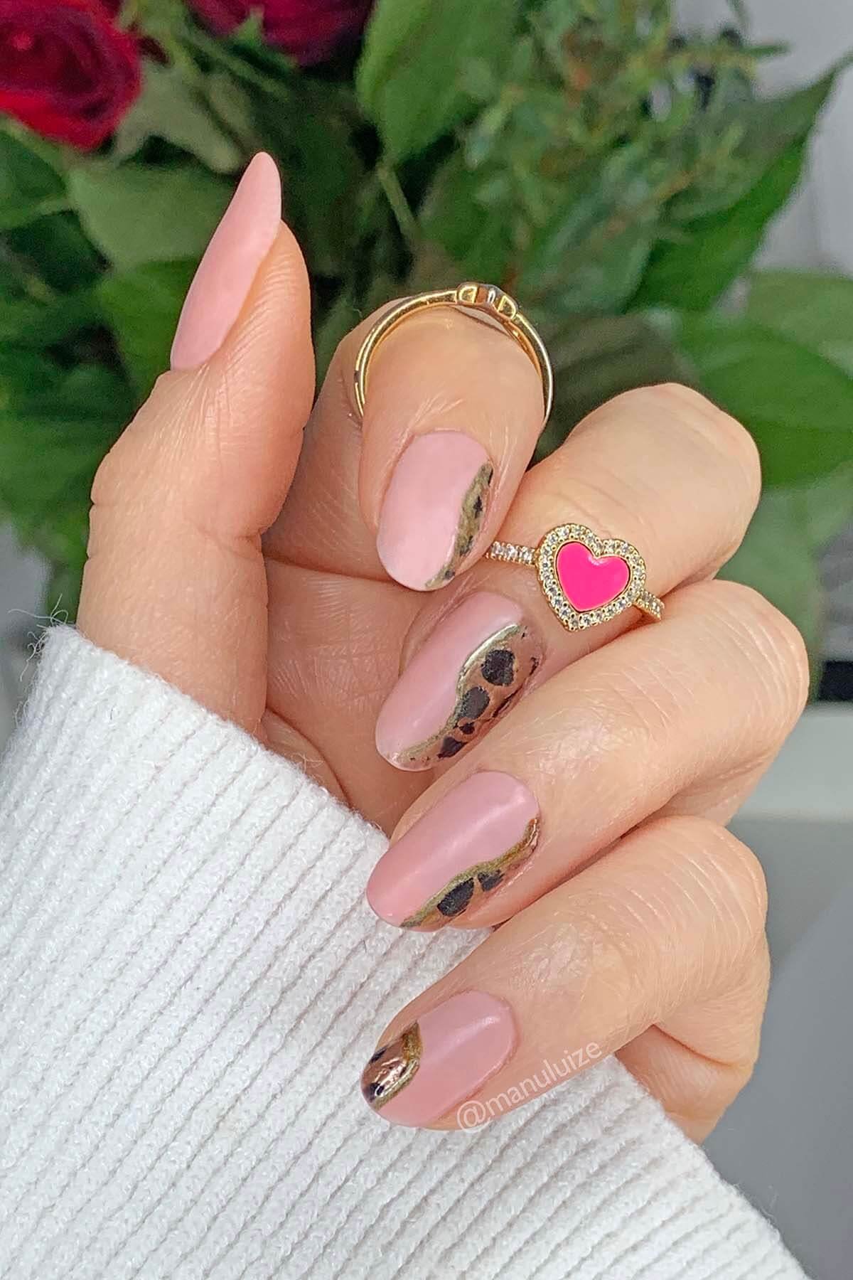 Pink animal print nails