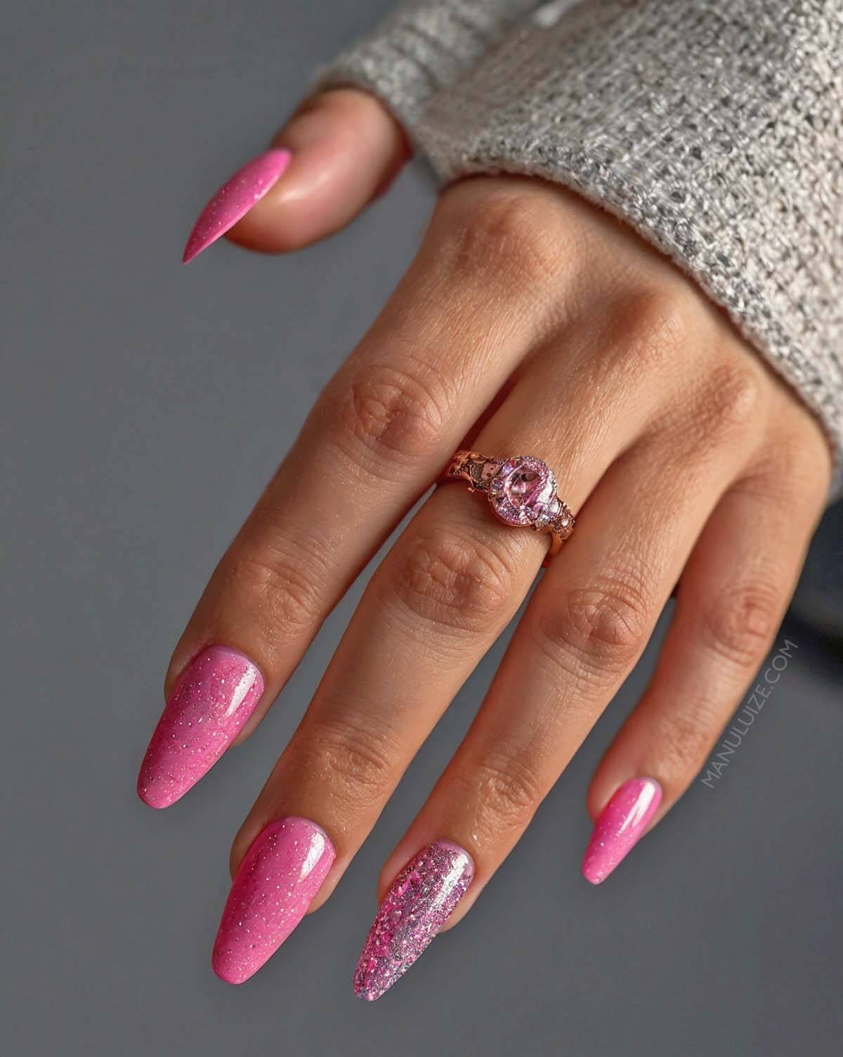 Hot pink glitter manicure