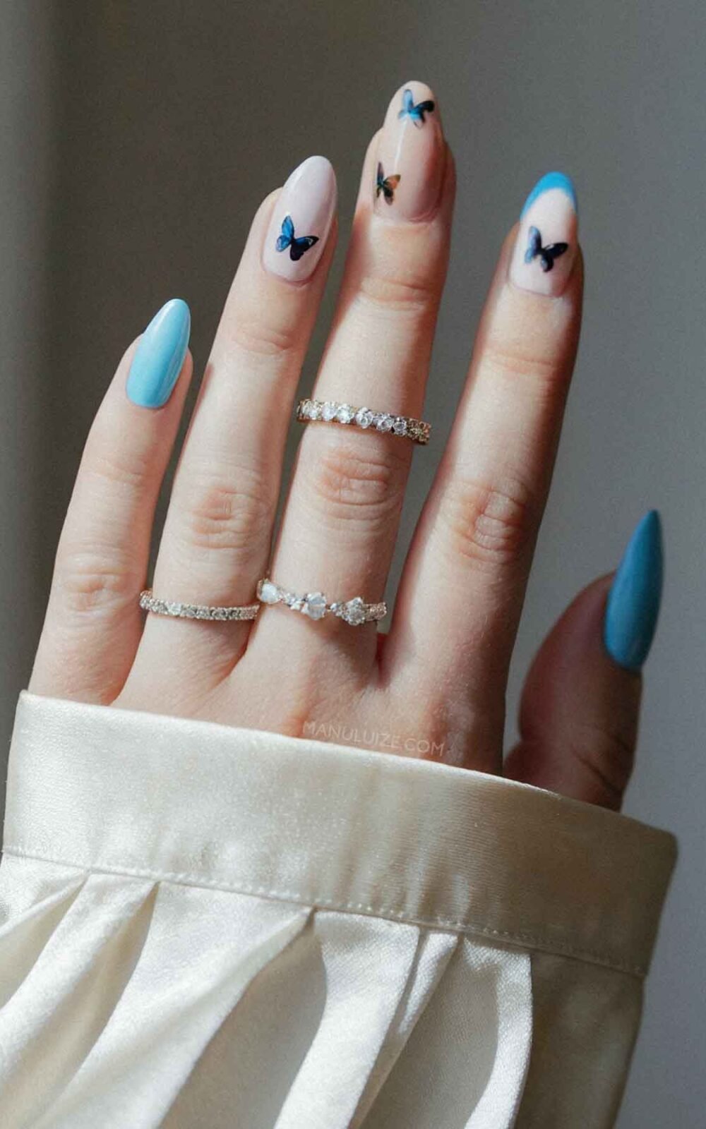 Butterfly blue nail design Butterfly blue nail design