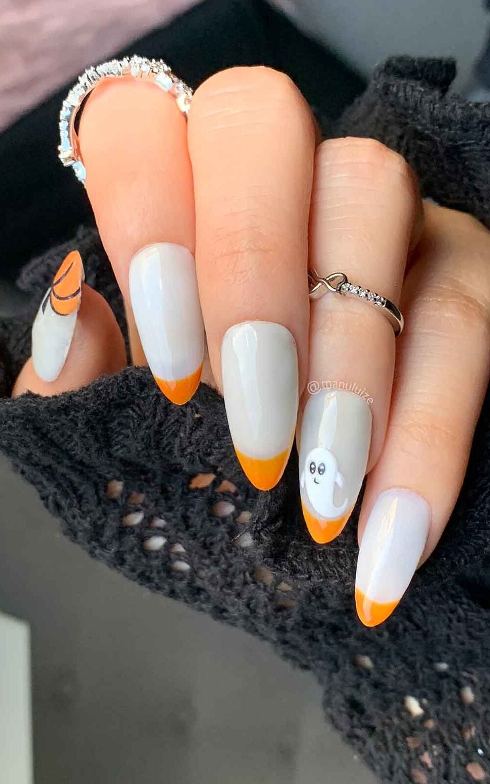 Cute pumpkin and ghost Halloween nails Cute pumpkin and ghost Halloween nails