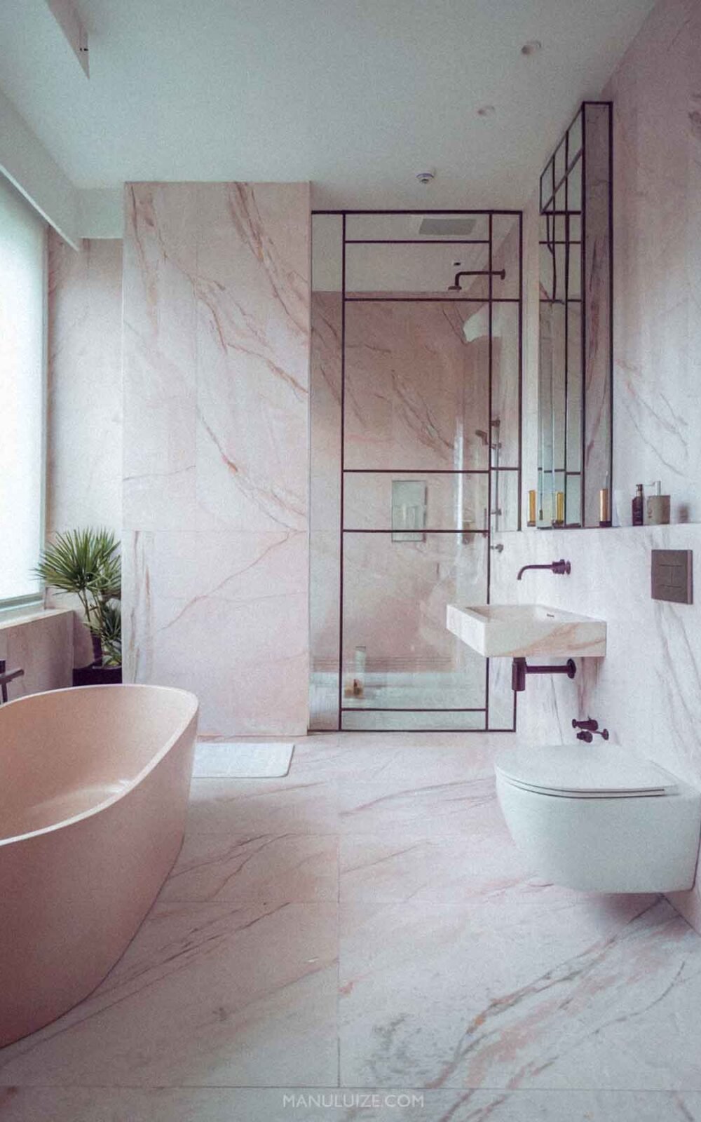 Marble bathroom with pink tub Marble bathroom with pink tub