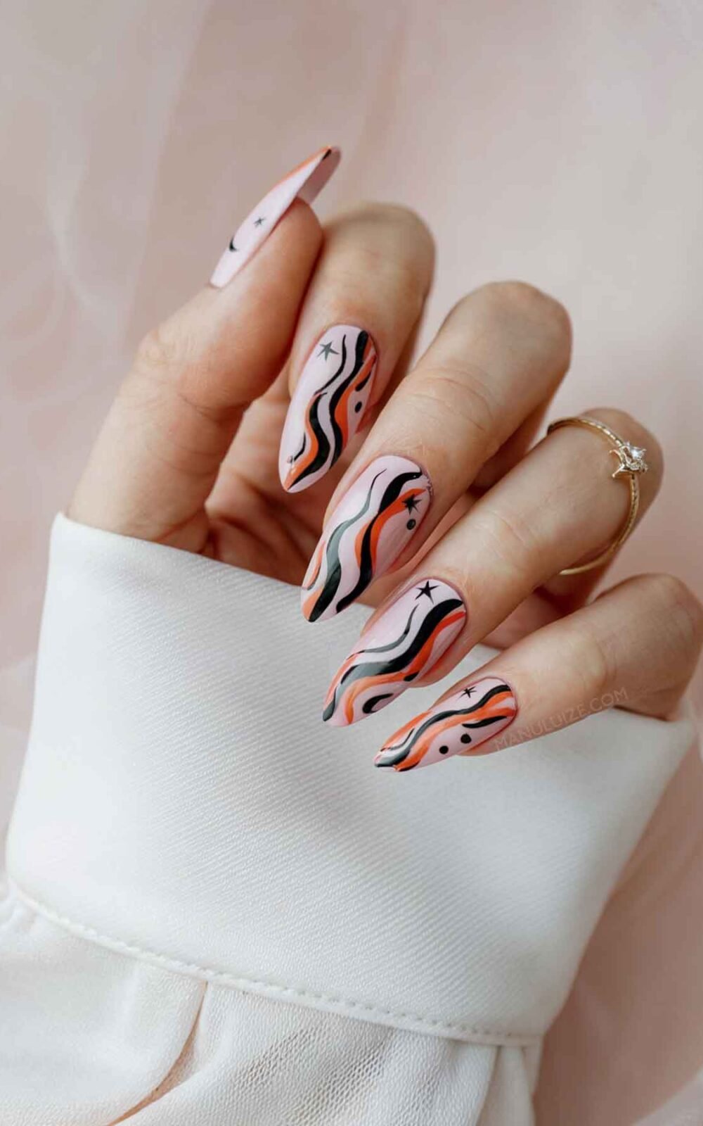 Nude, black and orange nail design Nude, black and orange nail design