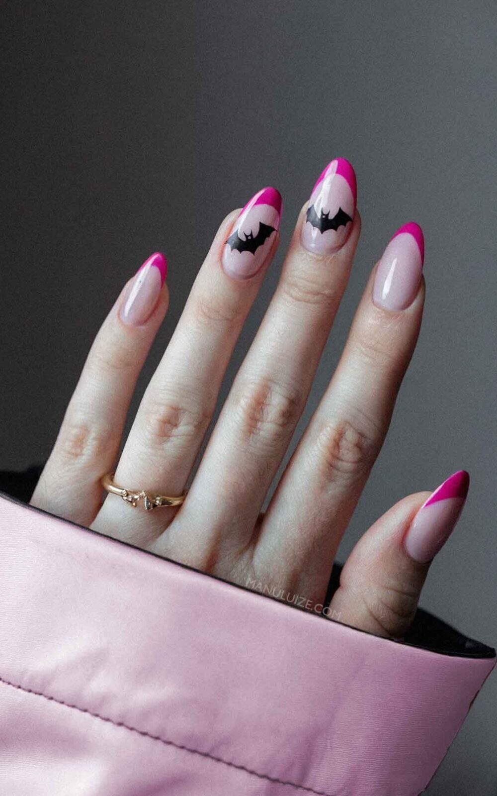 Pink french tips with bat Halloween nails Pink french tips with bat Halloween nails