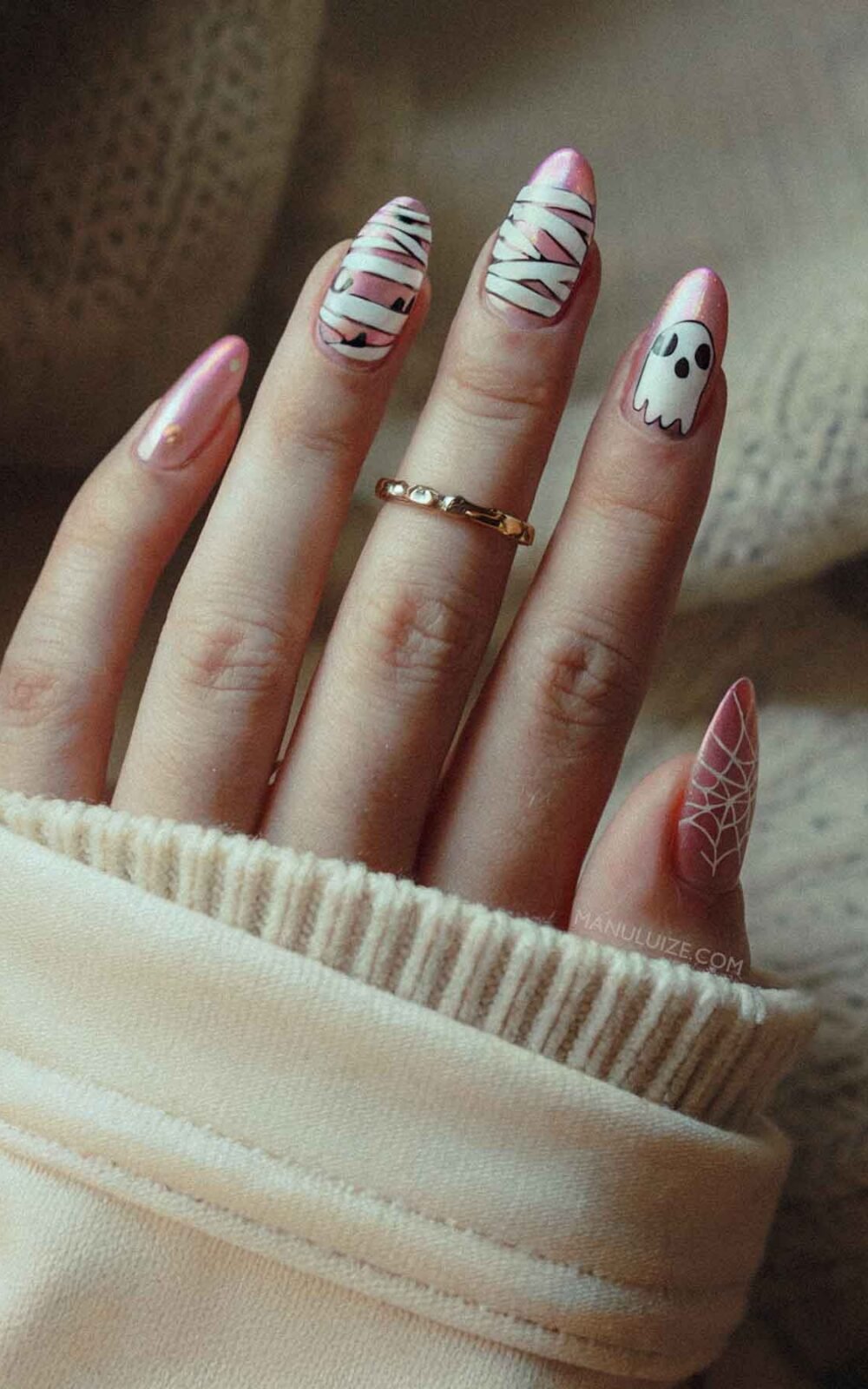 Pink halloween nails with cute design Pink halloween nails with cute design