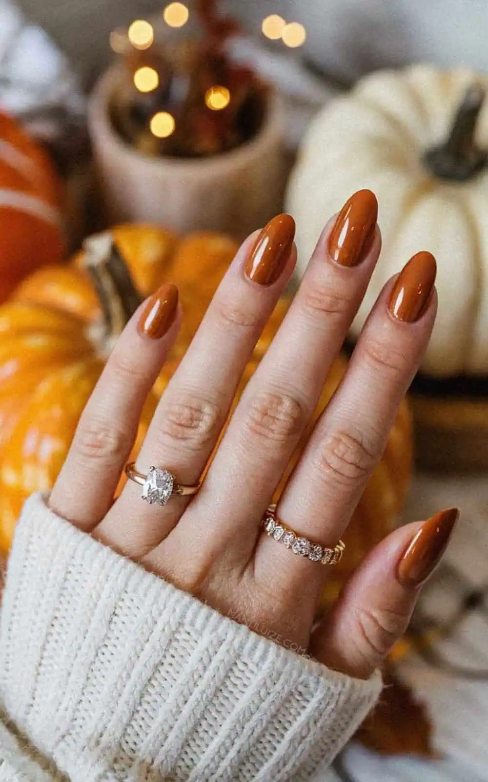Beautiful burnt caramel nails on dark skin