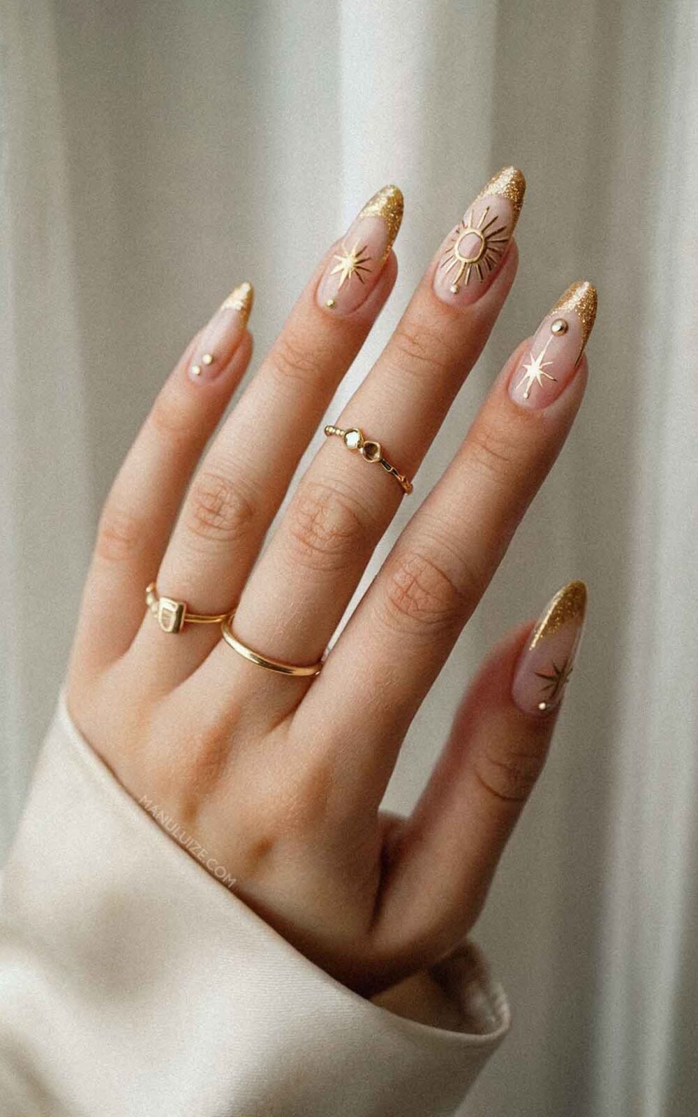 Nude and gold classy witchy nails